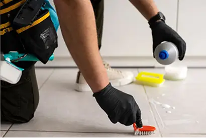 a person cleaning the floor